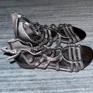 Beautiful shining dark silver sandals